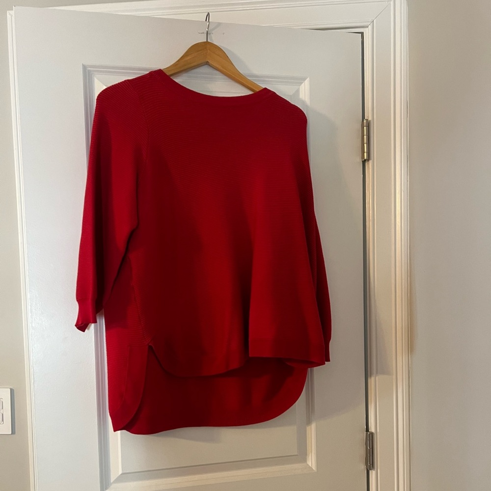 Red rubbed sweater